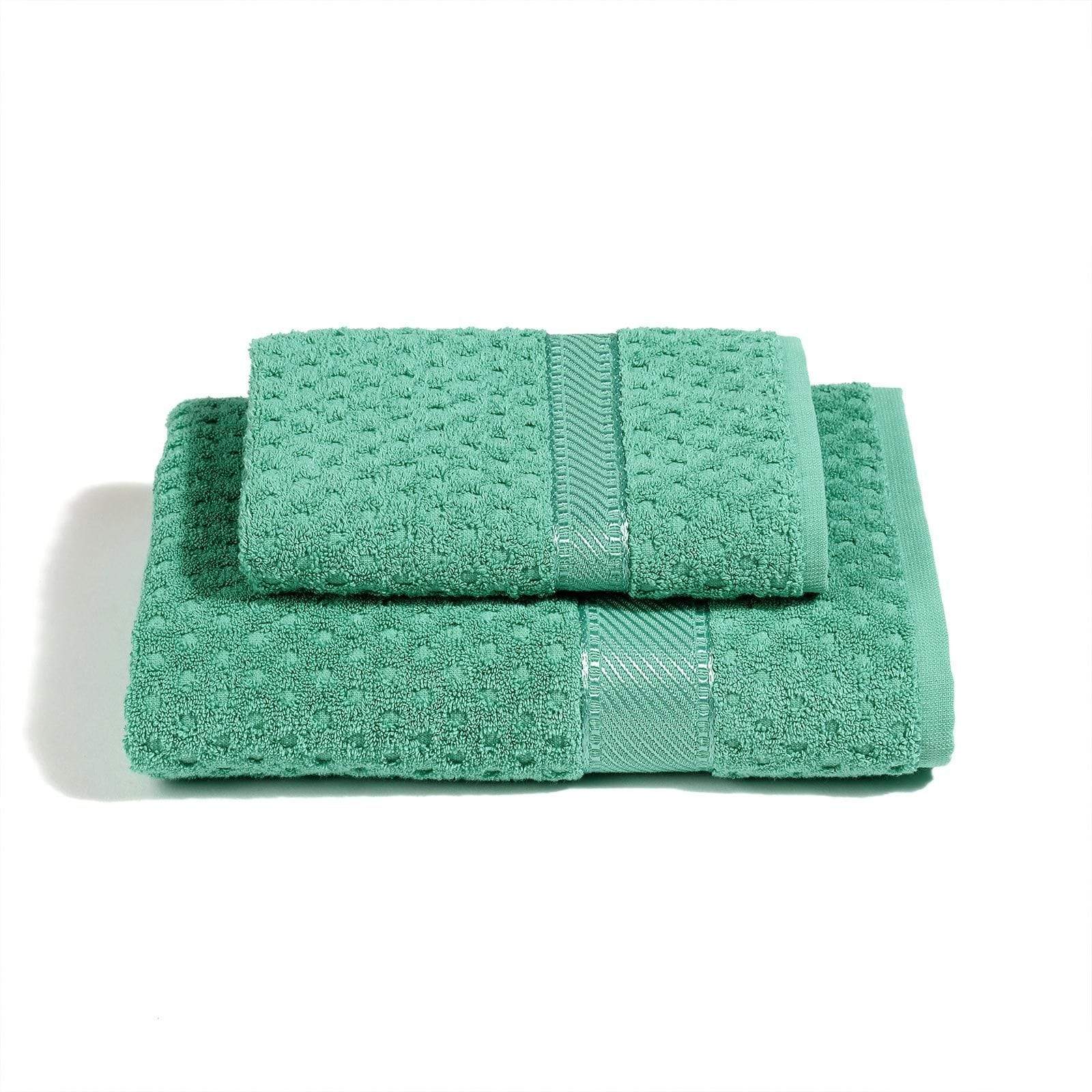 Asciugamano in velour di cotone con lavorazione geometrica a rilievo Asciugamano in velour di cotone con lavorazione geometrica a rilievo